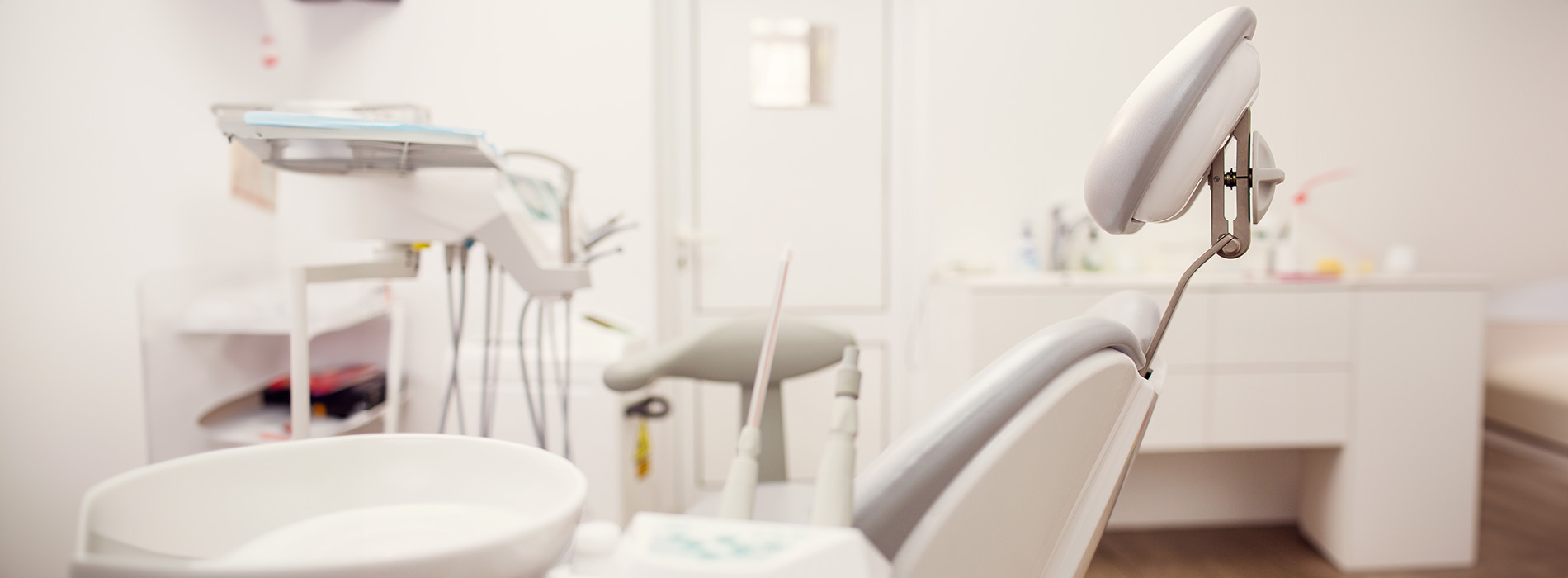 A collage of two photos showing a dental office interior with chairs, equipment, and a white color scheme.